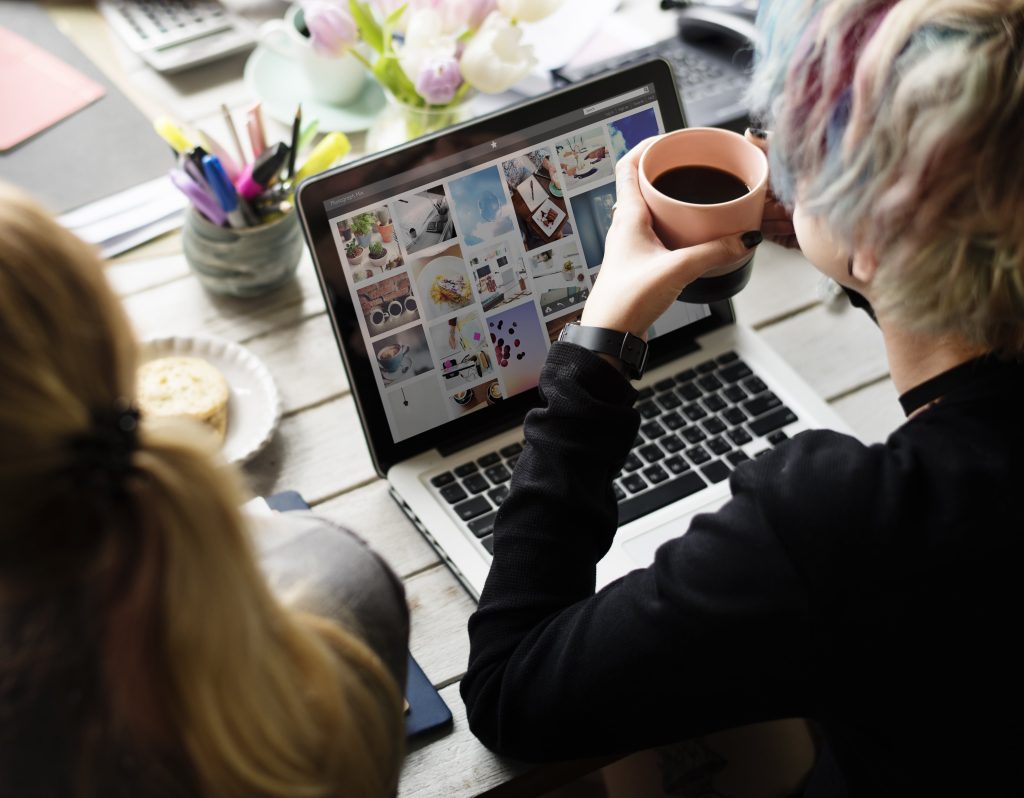 woman hands holding coffee cup working on laptop 2023 11 27 05 13 01 utc min